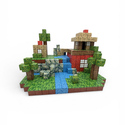 Et detaljert og kreativt landskap bygget med Klikkodilla magnetiske byggeklosser, som viser hus med murstein- og tremønster, et blått fossefall og grønne trær på en ren, hvit bakgrunn.