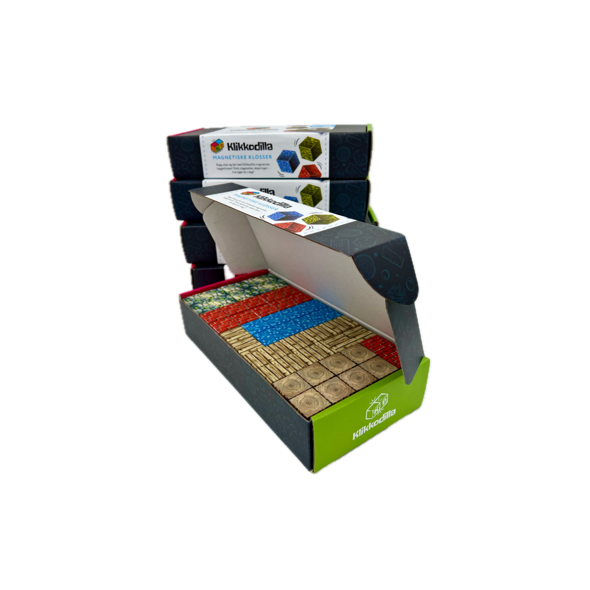 Åpen eske med Klikkodilla magnetiske byggeklosser som viser innholdet i startpakken, inkludert blokker med mønster av gress, tre, stein og vann.